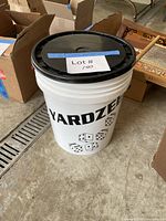 Bucket exterior showing Yardzee logo and dice graphics