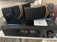 Onkyo receiver with two Bose speakers on top