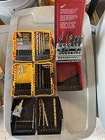 Overview of all drill bit sets in cases and countersink stop