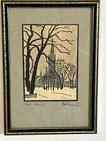 Front view of framed etching showing a winter scene with trees and a church spire, artist's signature and title visible below the image.