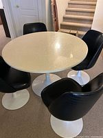 Full set showing table and four chairs