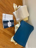 Overview showing tablecloth, placemats, towel bundles