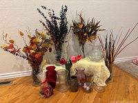 Group shot of vases, potpourri and faux floral arrangements