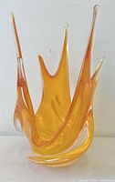Front view of orange Chalet art glass vase showing free-form spikes
