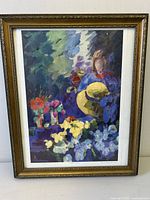 Full front view of framed lithograph showing artwork, mat and gilt frame