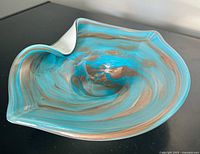 angled view showing interior swirls and shape