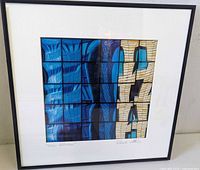 Full view of framed photograph showing mat, frame, and image