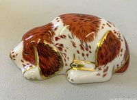 Top view of sleeping Imari puppy figurine showing overall decoration