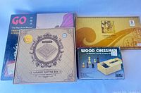 All four boxed games arranged for overview