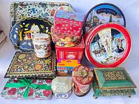 Group shot of all trays and tins front view