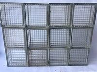 Front view of all twelve glass blocks arranged 3 x 4