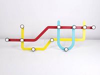 Full view of Umbra subway wall hook showing the red, yellow, and blue metal lines with multiple white hooks.