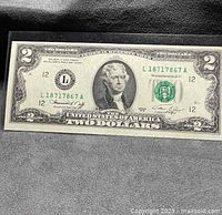 Obverse of 1976 $2 bill showing serial L18717867A and Thomas Jefferson portrait