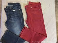 Both pairs laid flat showing colours and overall condition