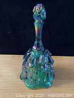 Full front view of iridescent green Fenton Bluebell bell