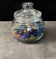 overall view of jar with lid and marbles