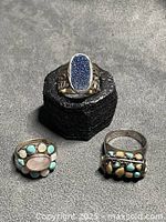 All three sterling silver rings displayed