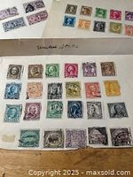 Main album page with 28 assorted used U.S. stamps