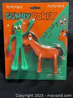 Front of unopened Gumby & Pokey package showing figures and autograph