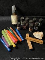 Group shot of essential oils, candles, palo santo, quartz