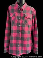 Full front view of pink and charcoal plaid flannel shirt on mannequin
