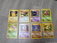 All eight Pokémon cards laid out front view