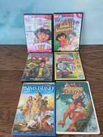 All six DVD cases front covers displayed on table