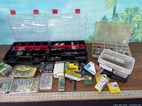 Wide view of all organizers, boxes and retail packs on table