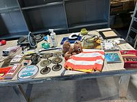 Overall view of assorted items on table