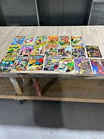 All 19 comics laid out on table