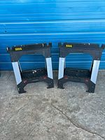 Both Stanley FatMax folding sawhorses standing side by side