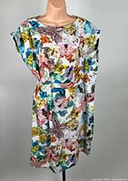 Front view of Cacharel floral dress on mannequin