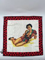 Full view of scarf laid flat showing entire design