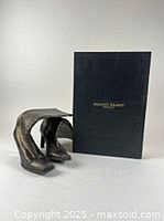 boots standing with branded box