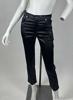 Front view of black slim pants on mannequin
