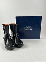 Pair of boots with Sperry box