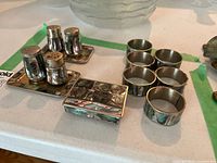 Complete set: 6 napkin rings, salt & pepper shakers on tray, hinged box, all with abalone mosaic
