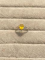 Front view of sterling silver ring with citrine stone