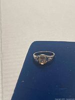 Ring on blue background showing overall design