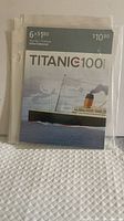 Front of sealed booklet showing Titanic 100 cover and $1.80 x6 notation