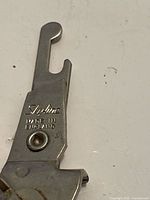 Close-up of Skyline marking on opener