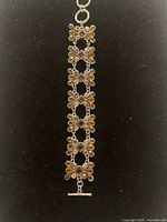 Full view of bracelet front showing design and clasp