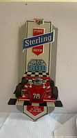 Front view showing Pure Sterling Beer Indy 500 design and 1978 Al Unser text