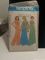 Front of Simplicity 6939 pattern envelope showing illustrated garment variations