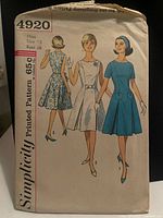 Front of Simplicity 4920 pattern envelope showing dress illustrations, size and price details
