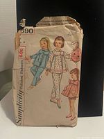 Front of Simplicity pattern envelope showing illustration and pattern number 590