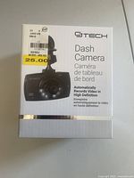 Front view of GTECH dash camera box showing the product image, brand name, description in English and French, and retail price sticker.