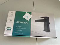 Box of Peerless Xander Lavatory Faucet showing brand, product image, and model number.