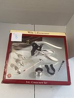 Original Wine Enthusiast 9-piece corkscrew set box showing all items included in the set with product image on front.