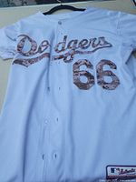 Front view of Dodgers jersey showing camouflage script and number 66